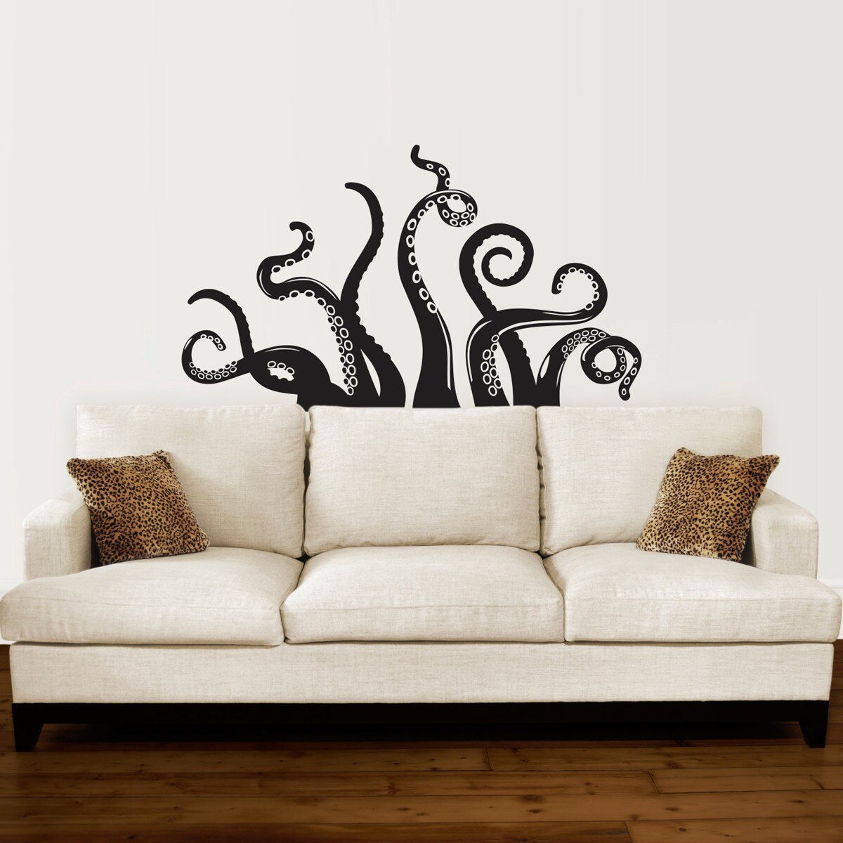 Octopus Wall Decal. Tentacles reaching out from behind a couch.